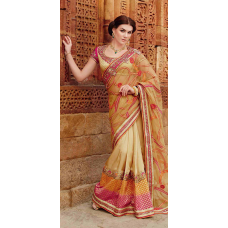 Enchanting Beige Colored Embroidered Tussar Silk Net Saree